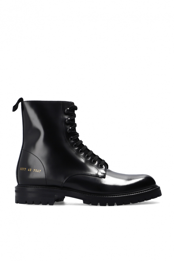 woman by common projects combat boots